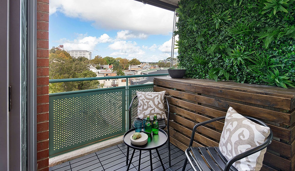 Balcony with artificial coastal green wall