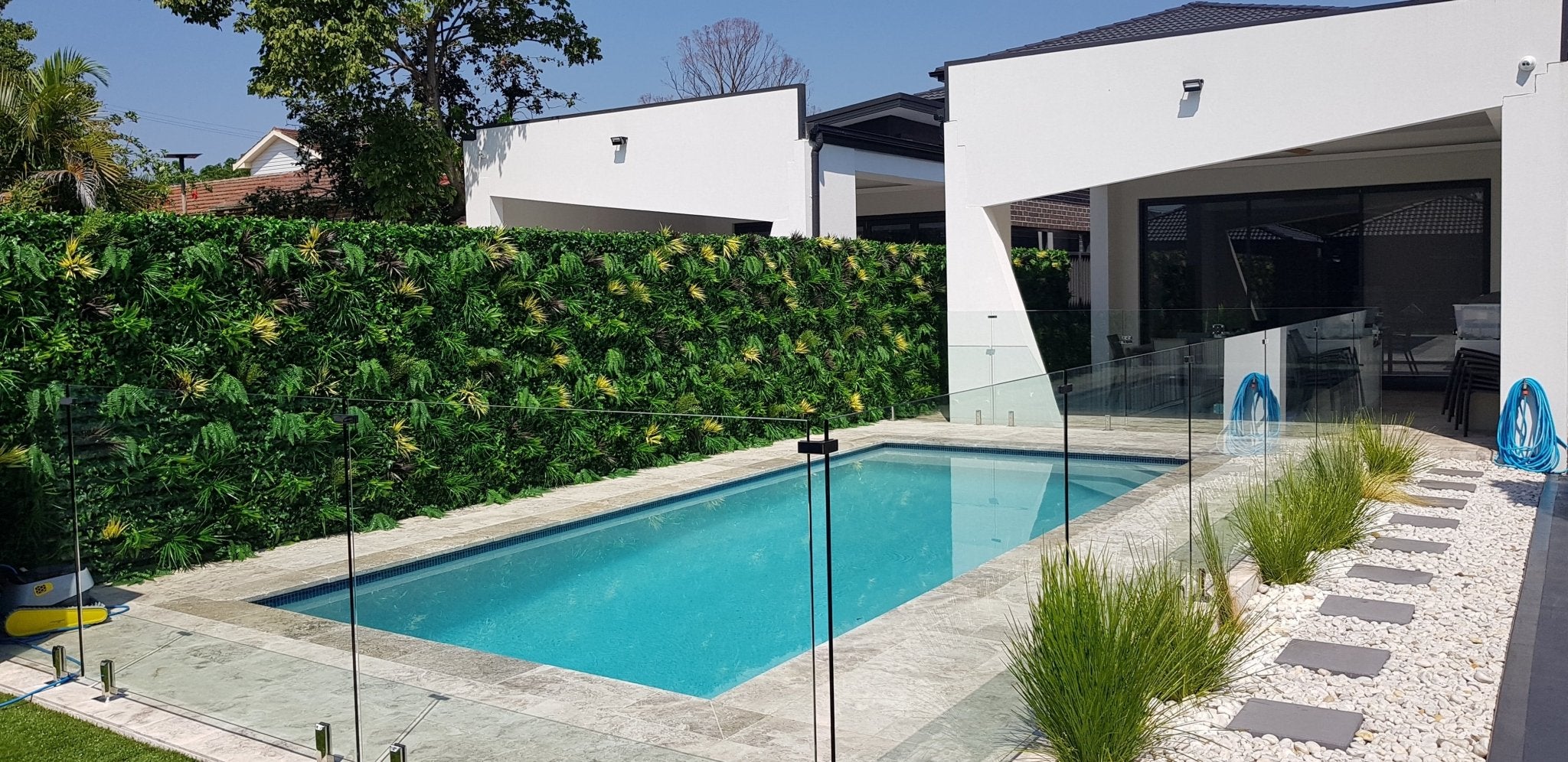 Residential Poolside Fence - Faux Vertical Garden - Evergreen Walls