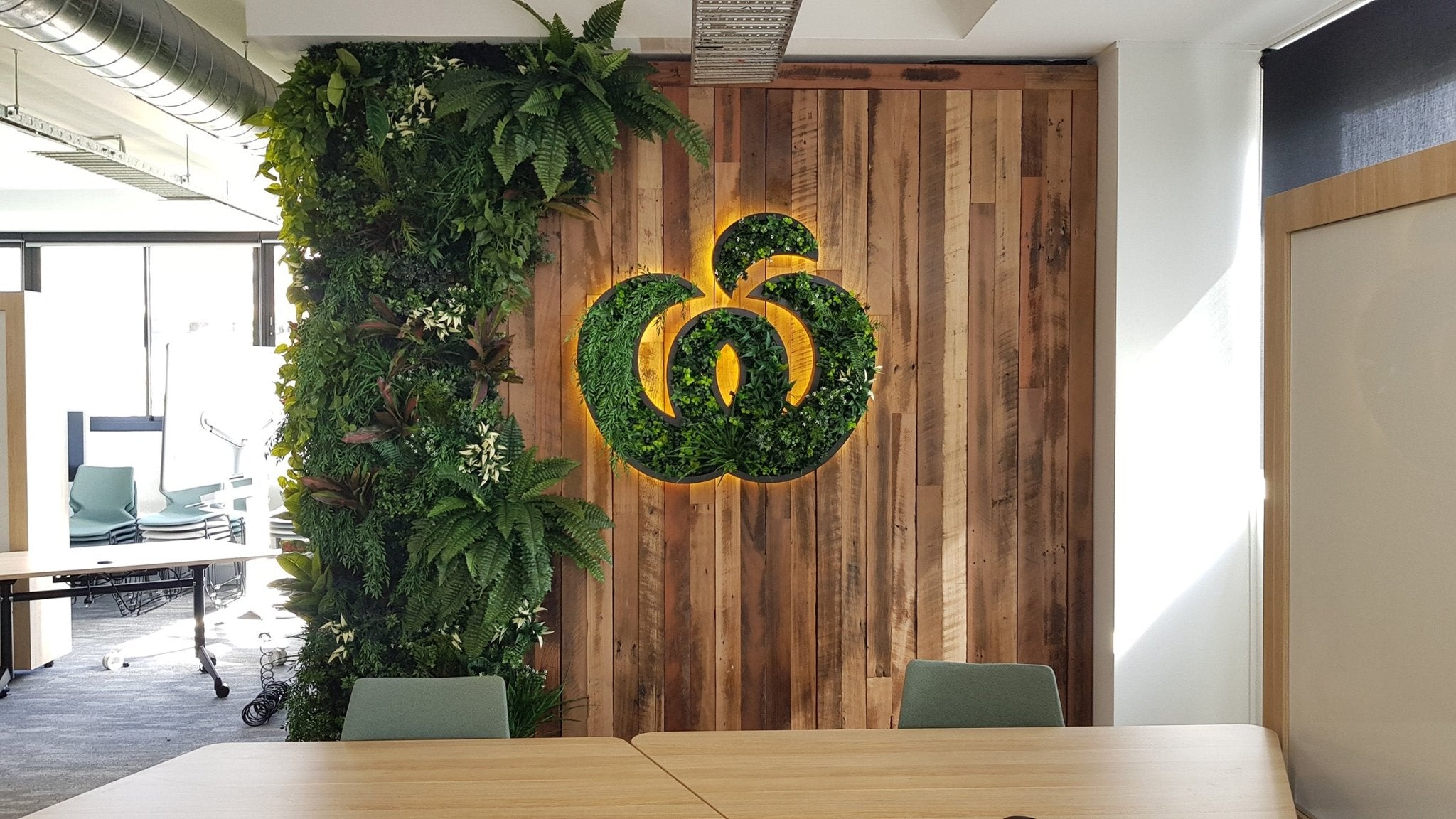 Woolworths Group | National Rollout of Custom, Recycled Greenery Logos - Evergreen Walls